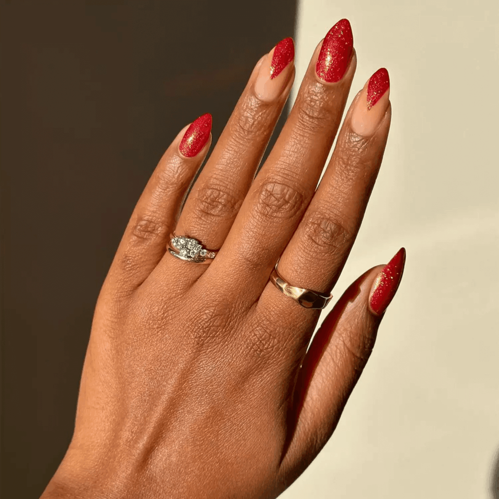 Shimmery Ruby Red Glitter Nails with Abstract Accent Art by melanated.mani
