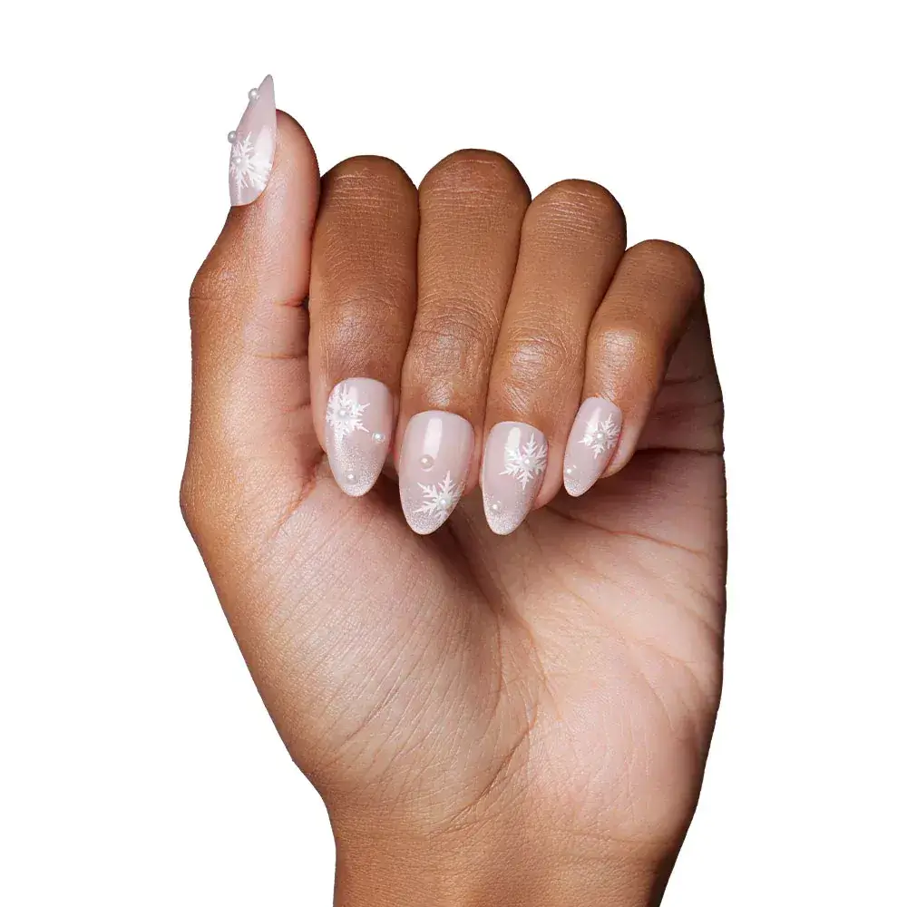 Snowflake-inspired intricate nail designs with detailed artistry. by glamnetic