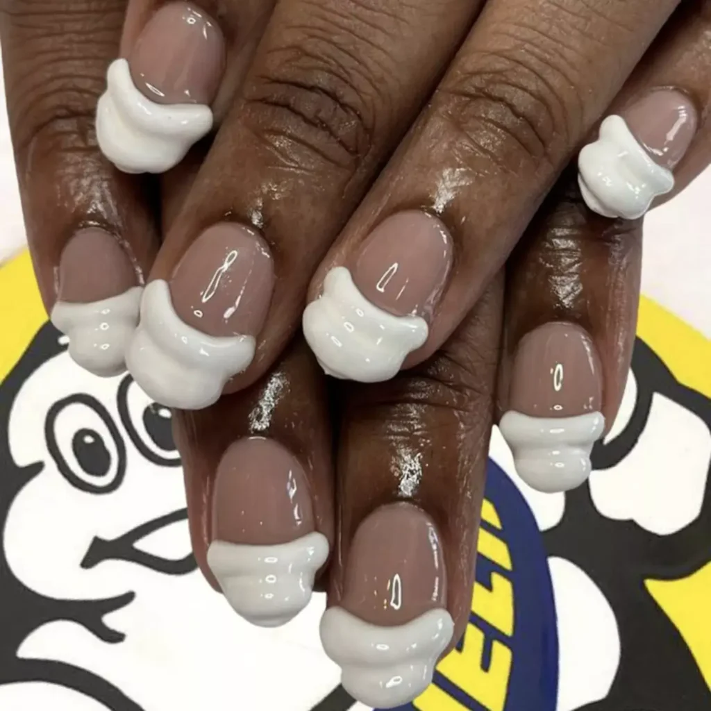 White French tip nails with 3D fluffy texture by manicures.nyc