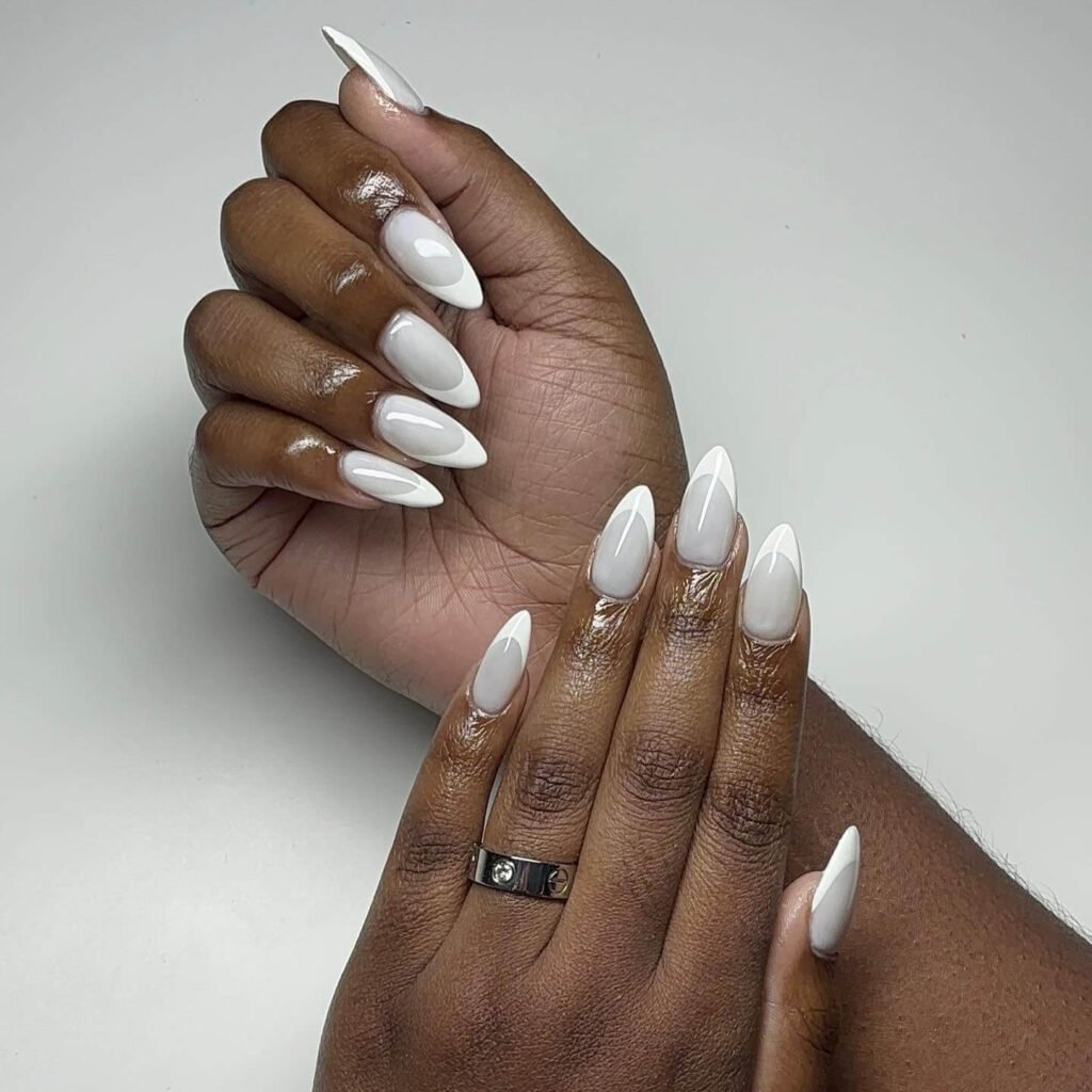 White French tip nails with all-white tones by nailsbylolu