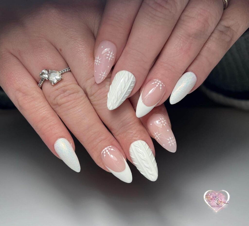 White French tip nails with sweater texture design by leannehartsandbows