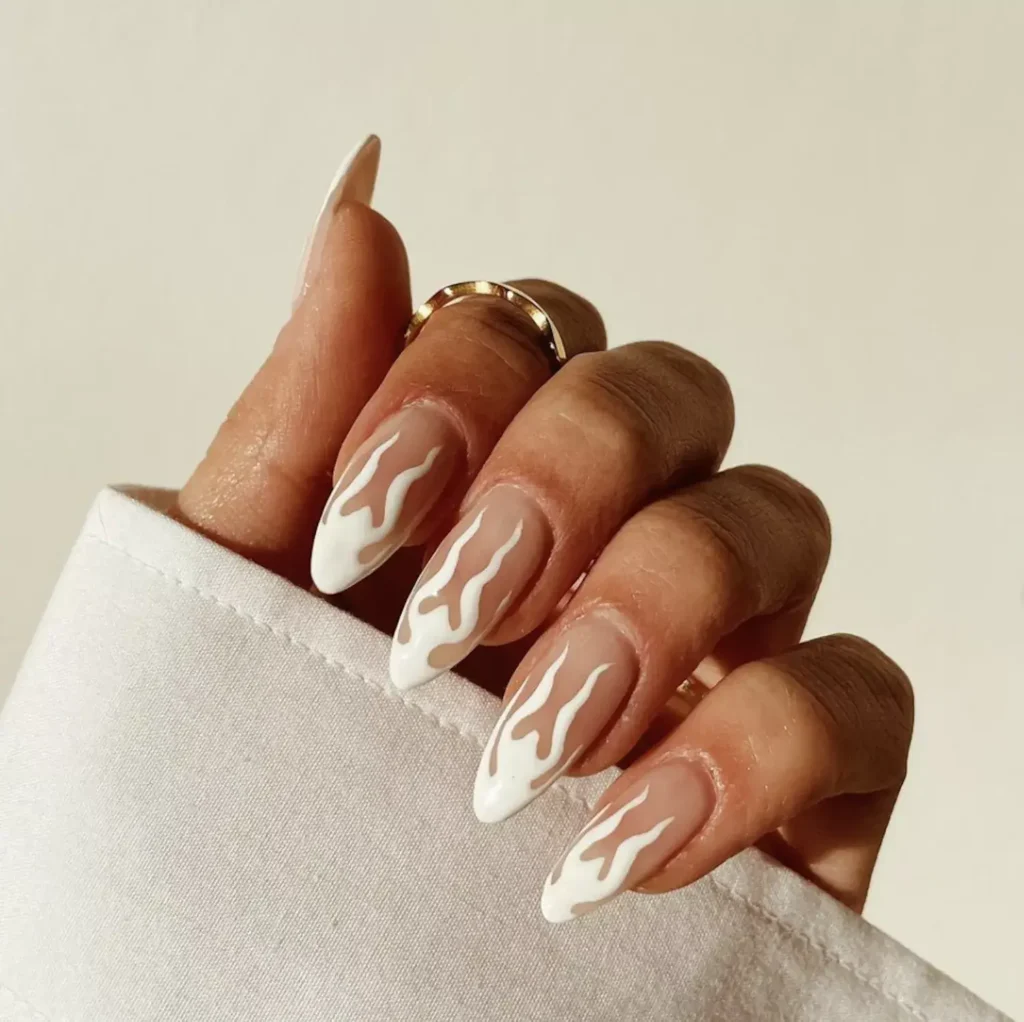White tip nails with flame-inspired accents by phoebesummernails