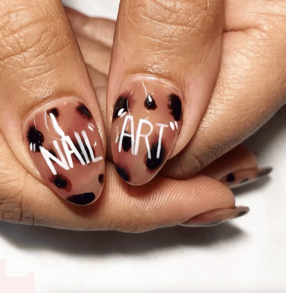 Almond-shaped nails with a trendy tortoiseshell pattern. by yo_keshh