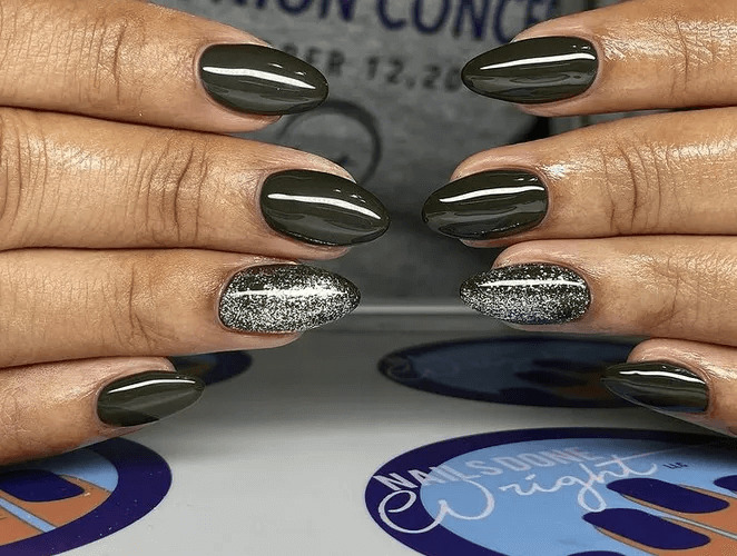 High-shine, glossy almond-shaped black acrylics. by nailsdonewright