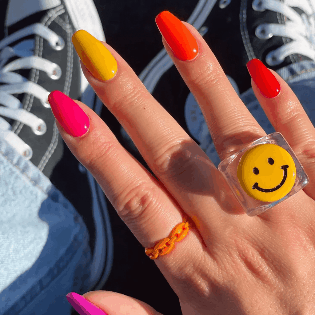 Mismatched opaque nails in orange and pink. by disseynails