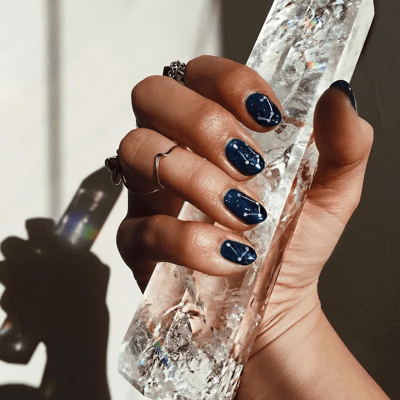 Navy blue acrylics with tiny constellation designs. by leleloveleigh
