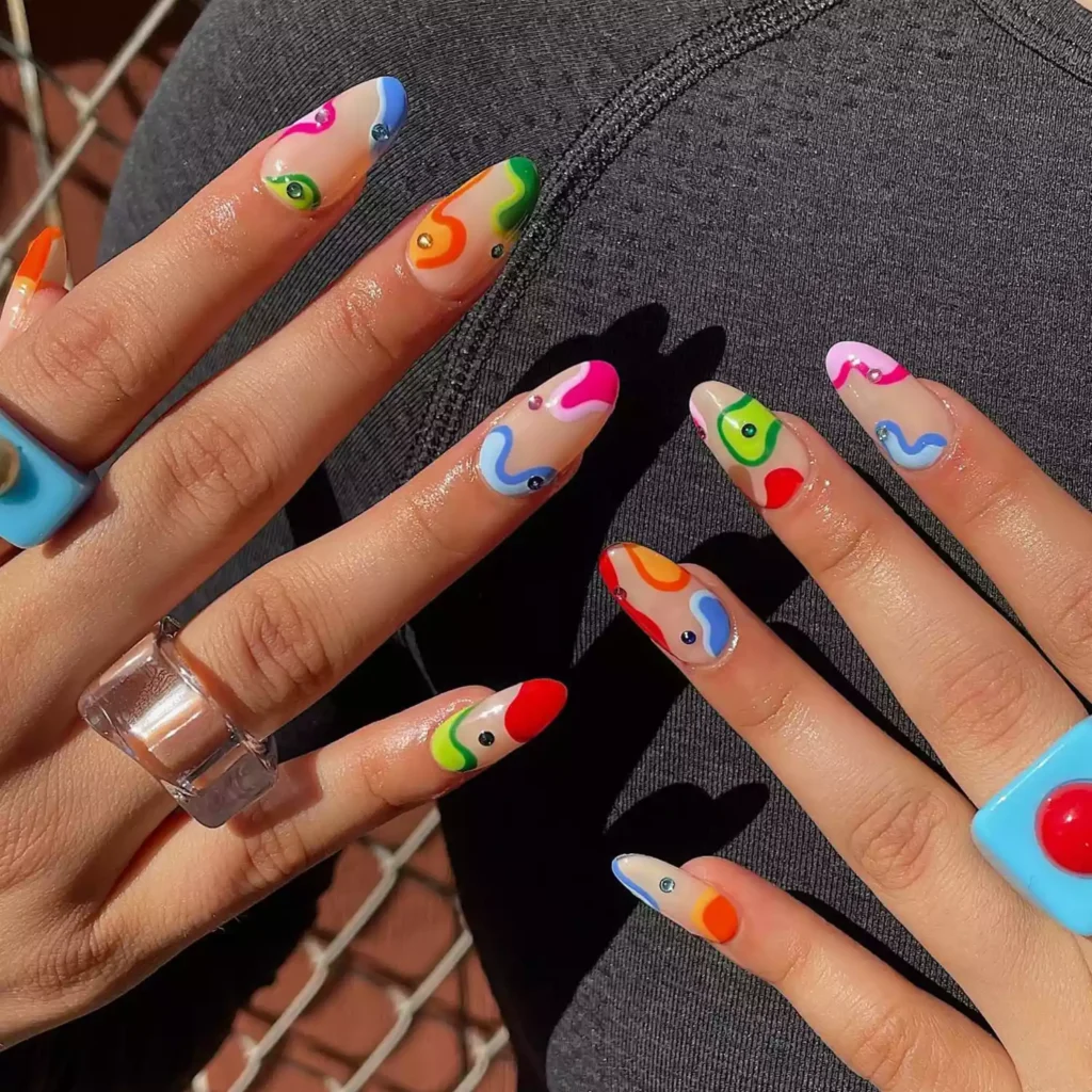Nude nails with colorful outlined blob designs. by myprettyset
