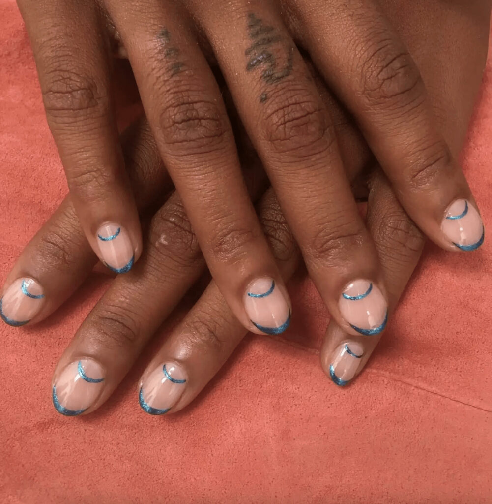 Nude rounded nails with metallic double-arch design. by chelseaqueen