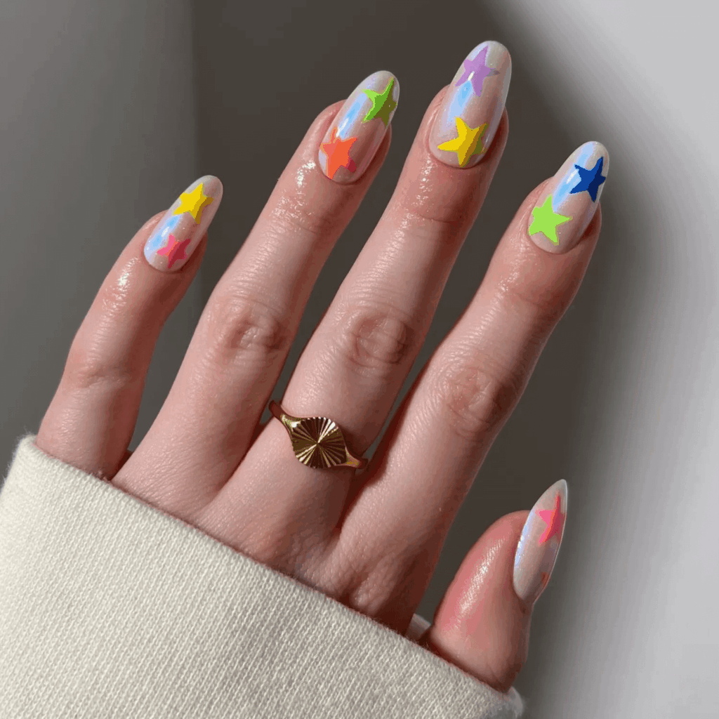 Opal chrome nails with bright neon stars. by pop_polished
