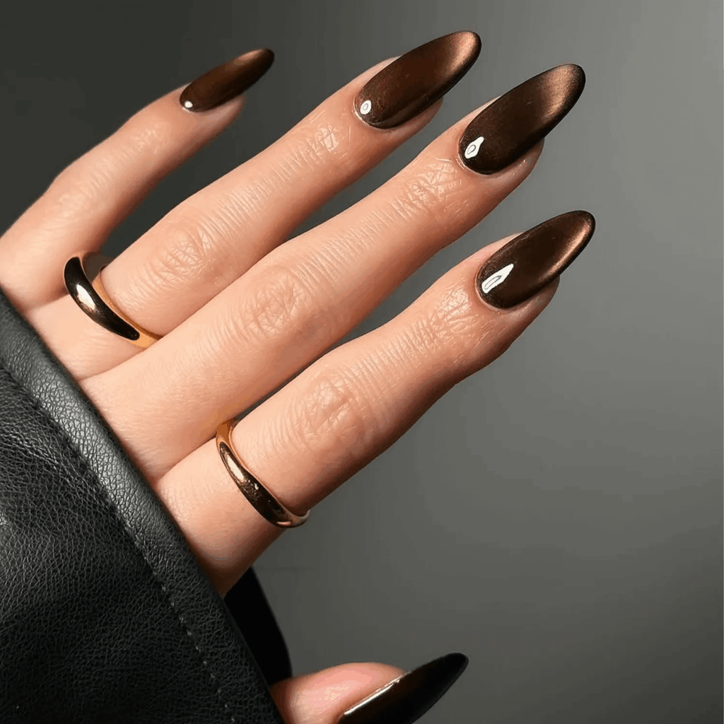 Rich espresso brown velvet manicure with a metallic sheen. by disseynails