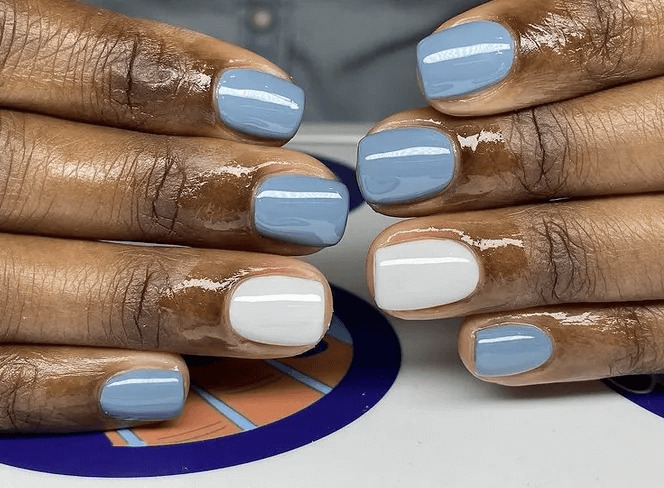 Short acrylics with a gradient baby blue manicure. by nailsdonewright