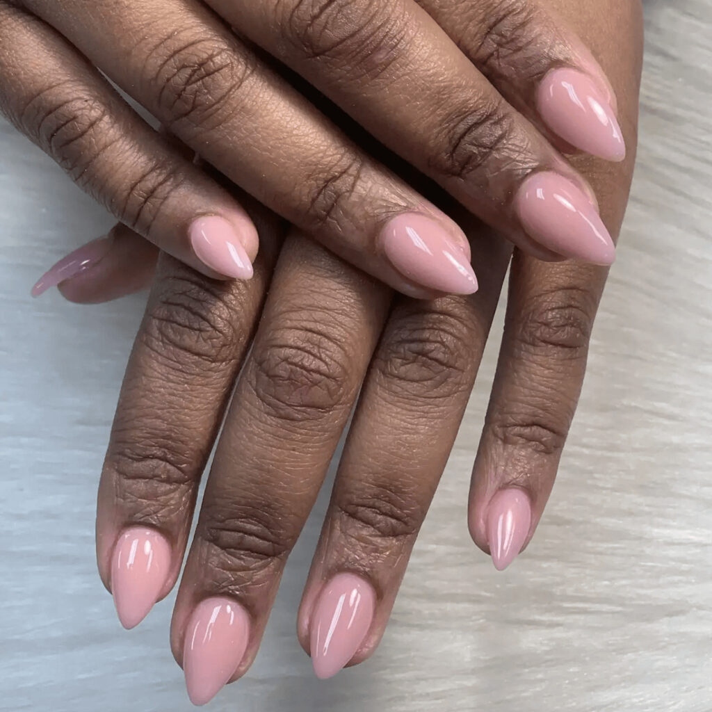 Short, dainty pink nails with a subtle point. by _cosmetic.doll_


