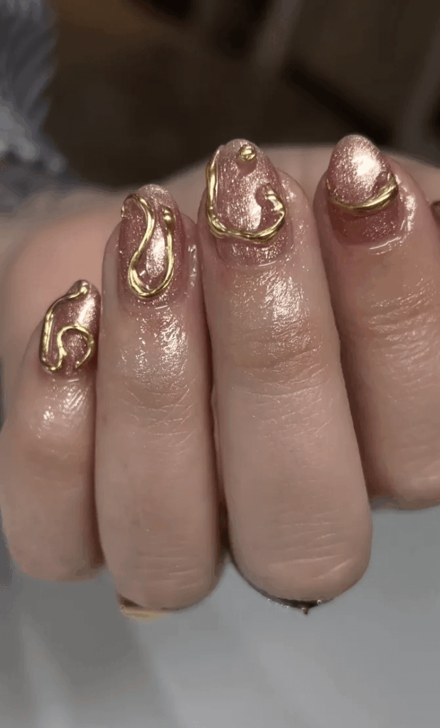 Short nails with intricate 3D gold ribbon gel art. by madnails