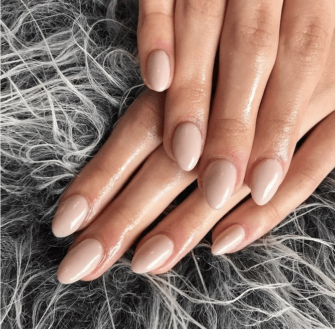Short, smooth rounded nude acrylics. by polishedbyellie_
