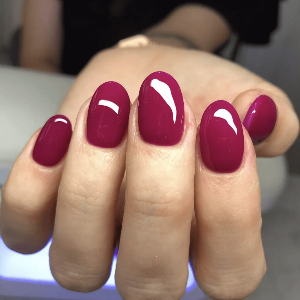 Short squoval acrylics in a rich raspberry hue. by glammertized