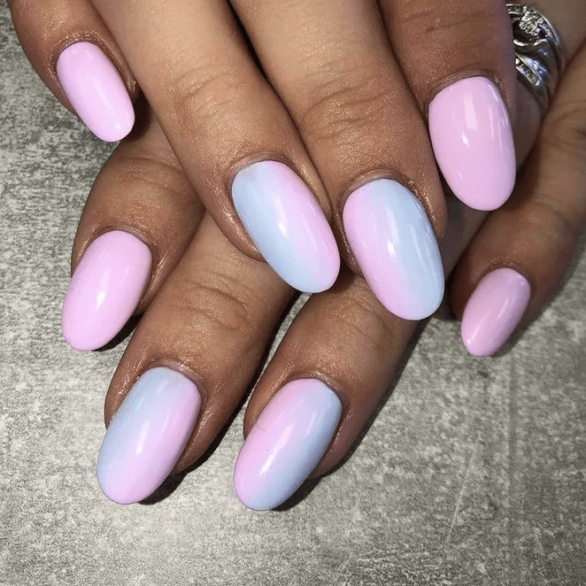 Soft pink and blue ombré acrylic fade. by spiritnailsandbeautybyfaye