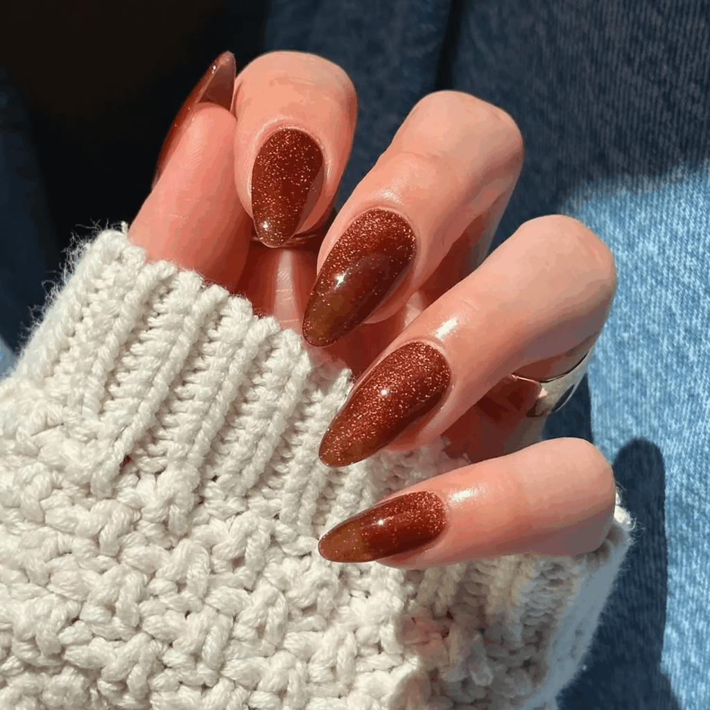 Textured cinnamon brown velvet nails with a warm shimmer. by disseynails
