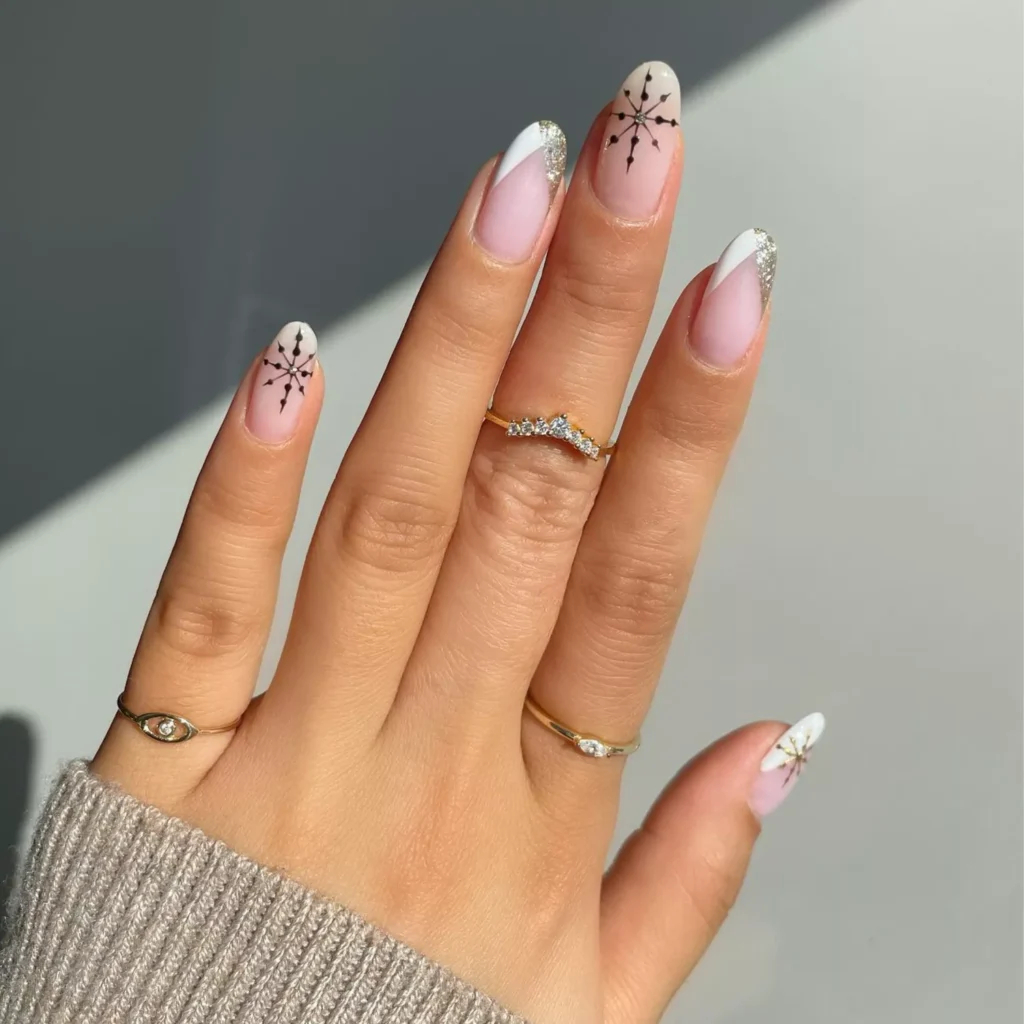 V-Shaped French Tips with Black Snowflakes by amyytran