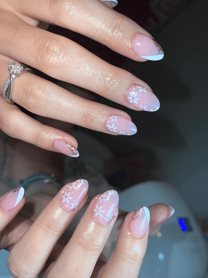 Beautiful nude color decorated with various flower designs. by 1999houseofnailsnz