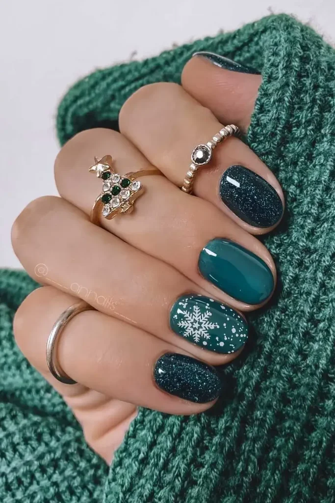Dark green Christmas nails with glitter and snow art. by ____annails____