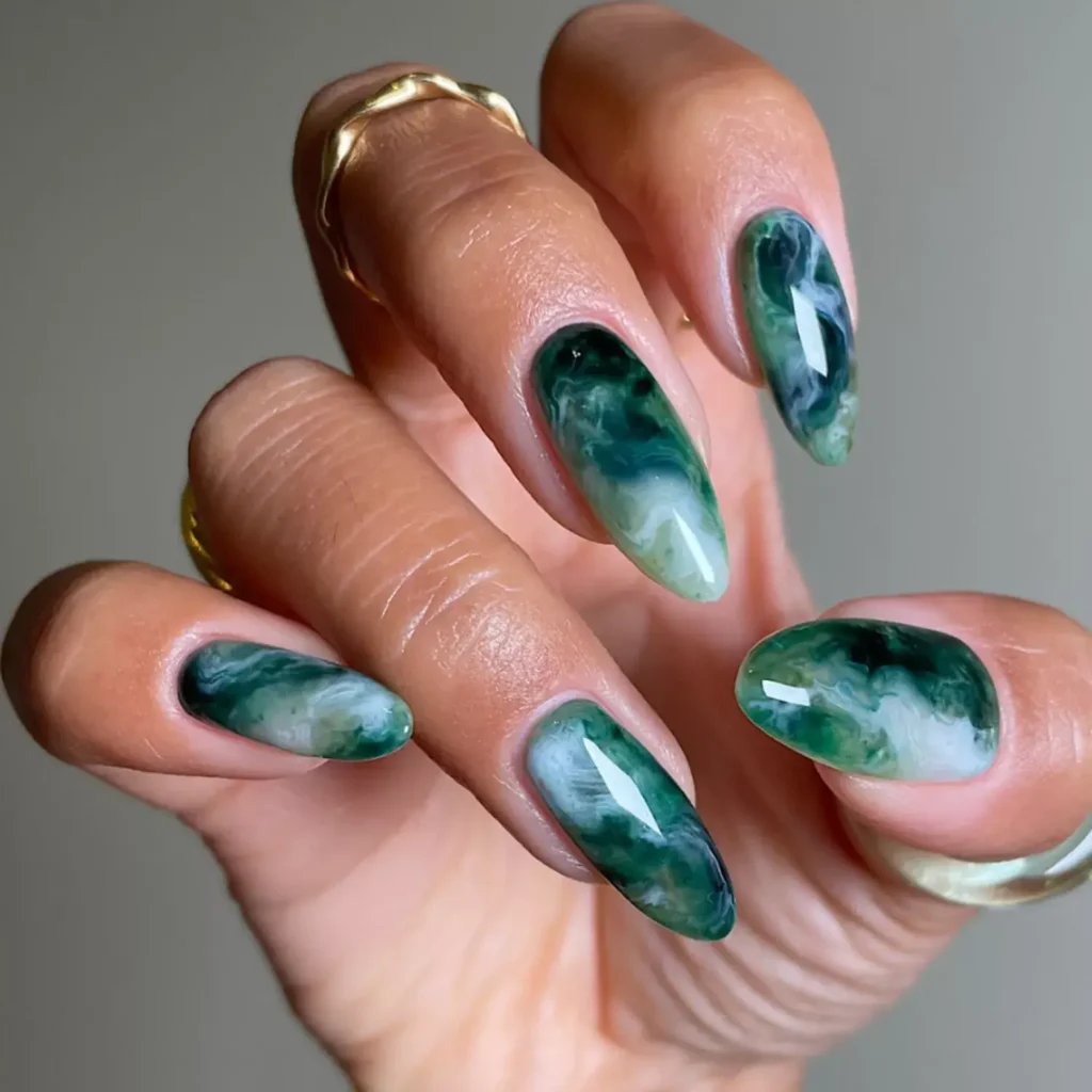 Dark green, mint, and sage marbled design. by nailedbyliv___