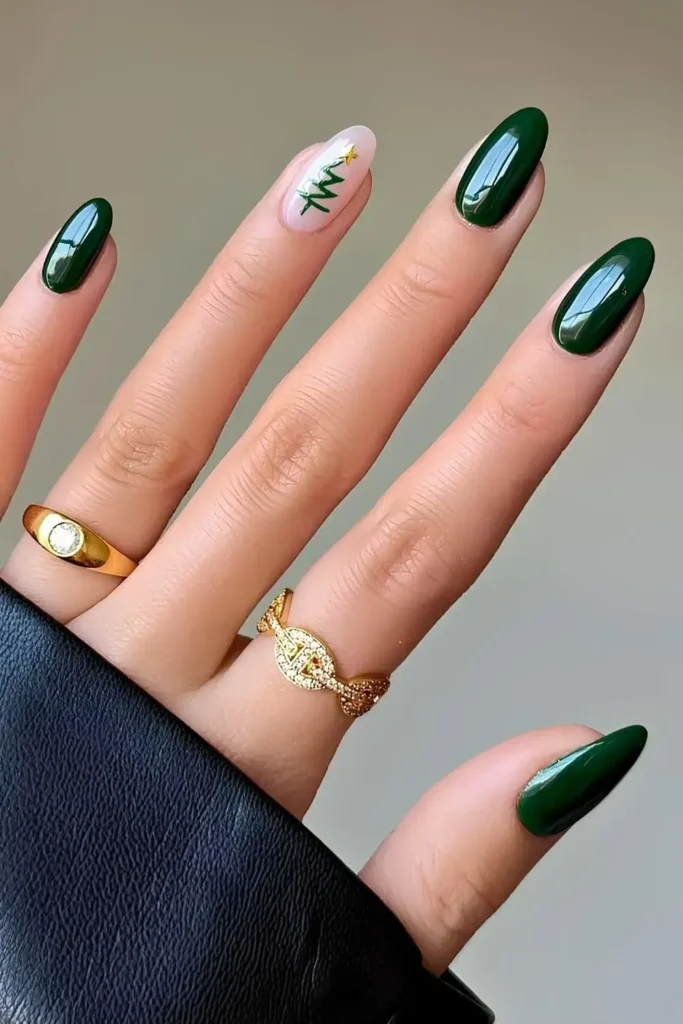 Dark green nails with Christmas tree art. by nailsbyalsn
