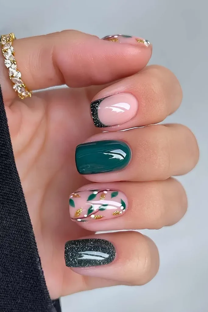 Dark green nails with mistletoe art and glitter. by nails.by.iz_
