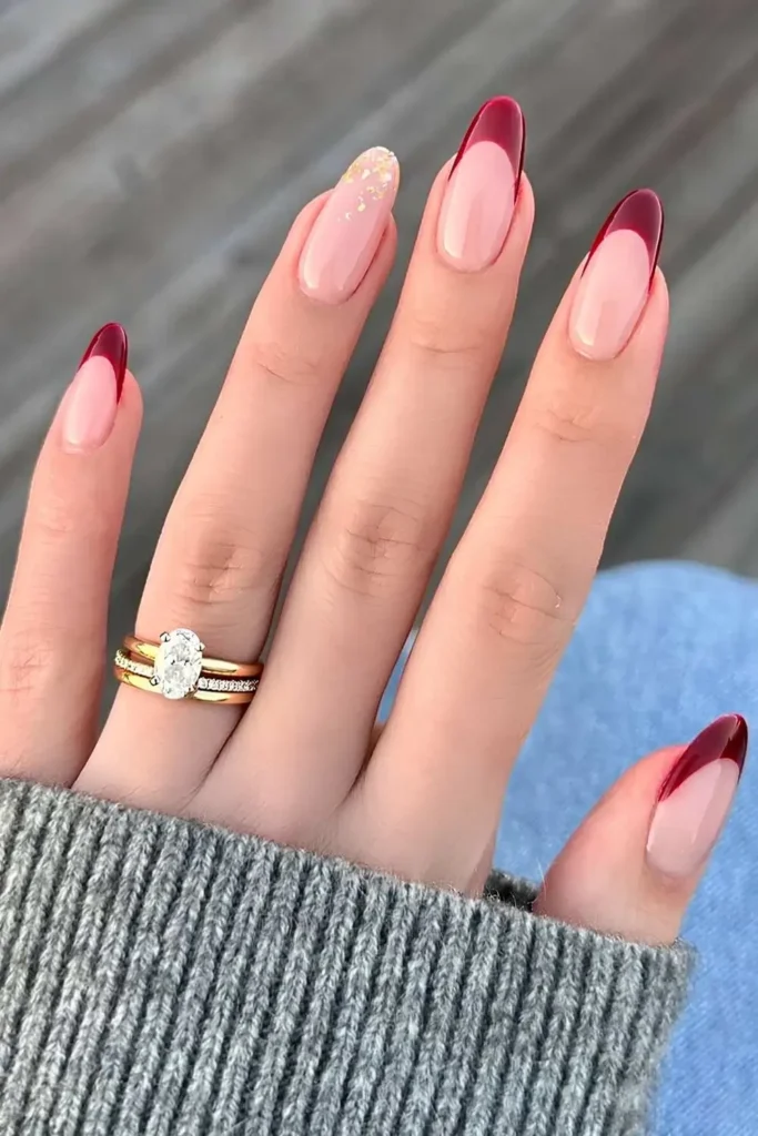 Dark red French nails with gold foil details. by heluviee