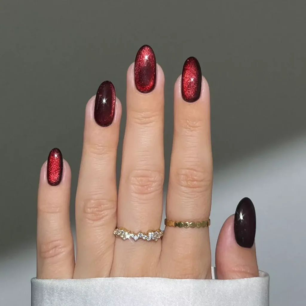 Deep red velvet glass finish over a black base. by heygreatnails