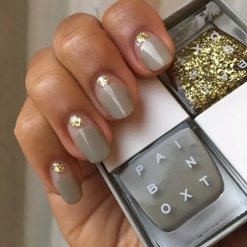 Image of nails alternating between a khaki green solid polish and a clear base with gold sequined dots. by paintboxnails
