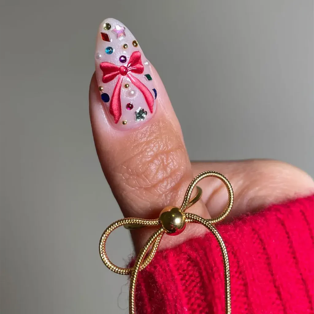 Intricate velvet bow art with extra gems. by sansungnails