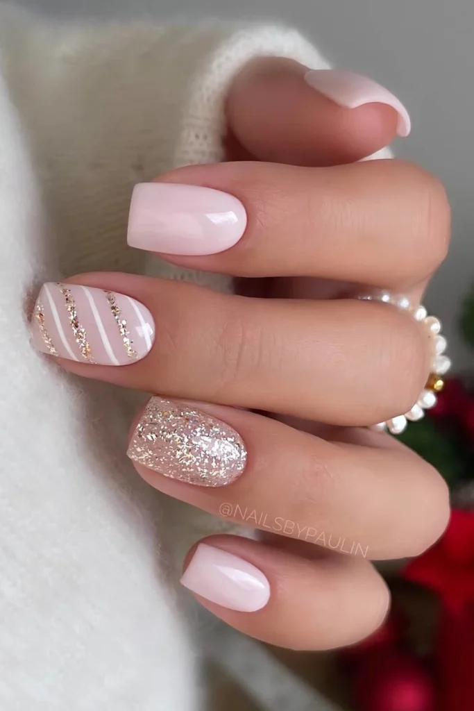 Light pink christmas nails with gold glitter. by nailsbypaulin