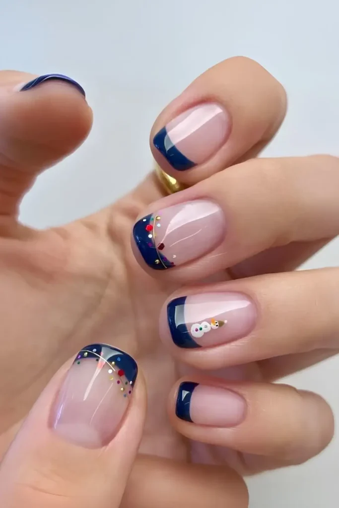 Navy French mani with winter holiday art. by nailalamode