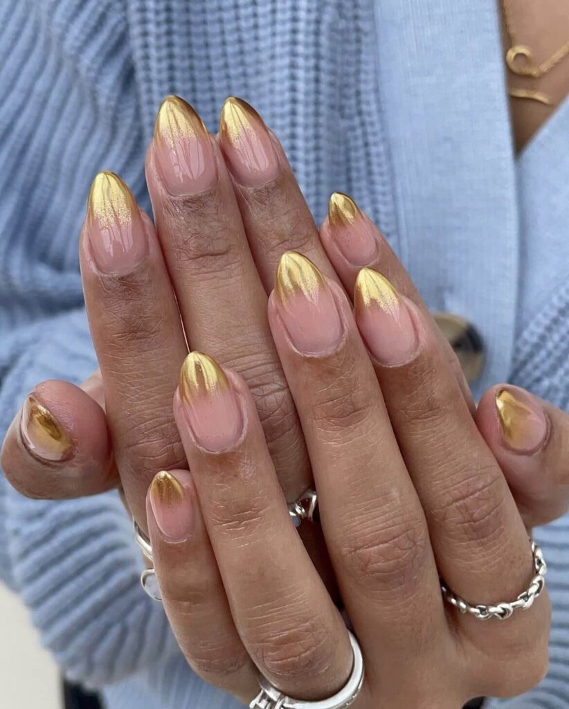 Neutral-nude-base-with-gold-chrome-French-tips by jodiesbeaute