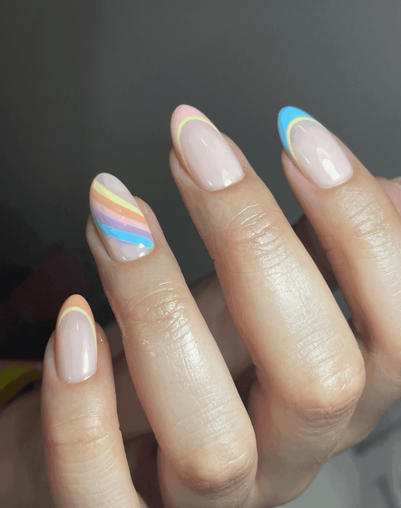 Neutral nude color accented by a rainbow of colors in the form of colorful abstract art. by 1999houseofnailsnz