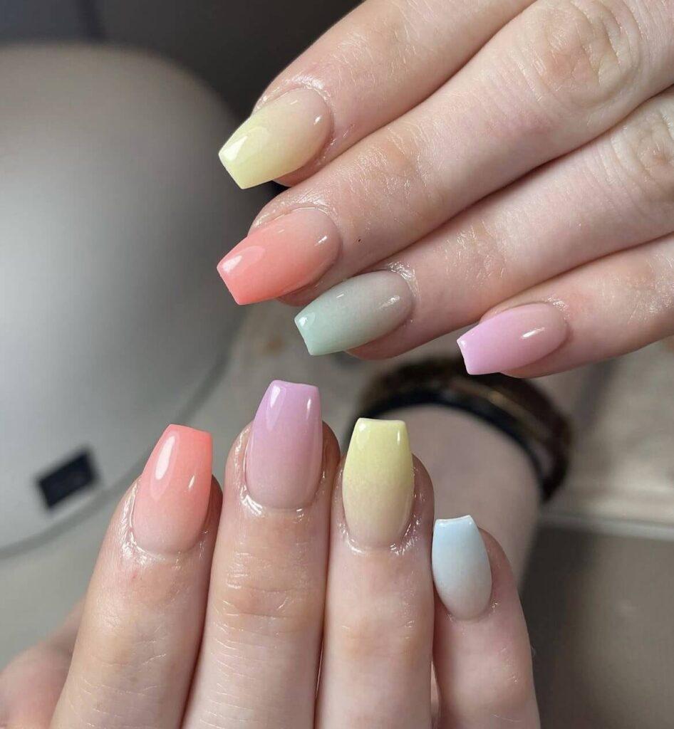 Ombre gradient design in shades of orange, purple, yellow, and green. by 1999houseofnailsnz
