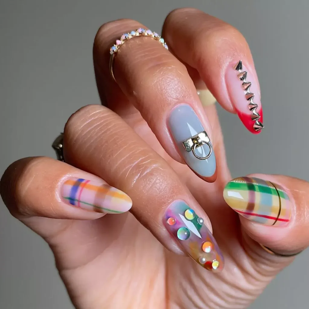 Plaid patterns with silver chrome and dewdrops. by sansungnails