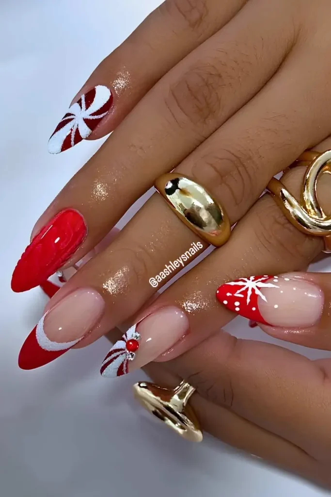 Red Christmas nails with sweater patterns and swirls. by aashleysnails