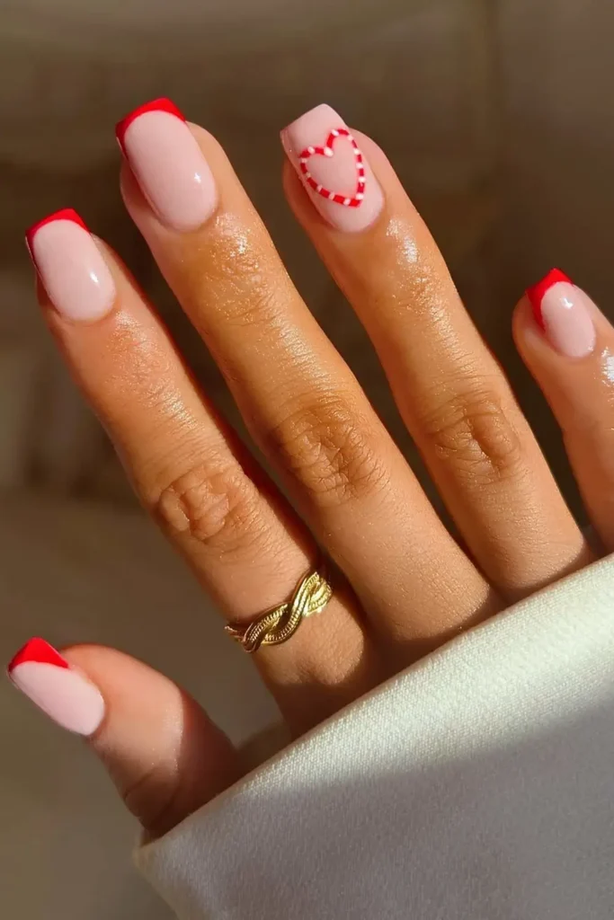 Red French manicure with candy cane heart art. by lillypalm__