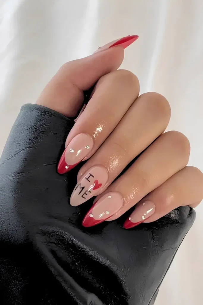 Red French tips with the phrase "I Love Me" written on the accent nails. by nailzkatkat