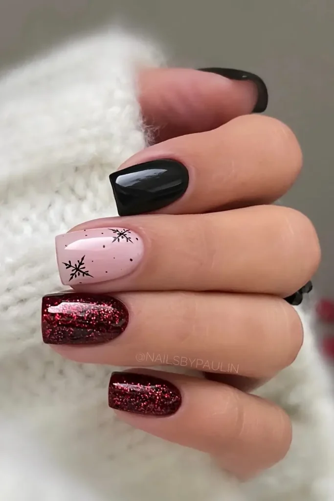 Red and black Christmas mani with glitter and snowflakes. by nailsbypaulin