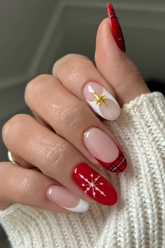 Red and white nails with Christmas motifs. by _by_shelley