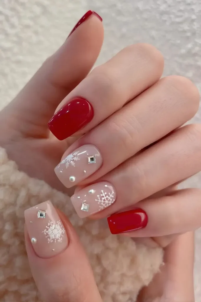 Red and white nails with rhinestones and snow art. by nail_mini