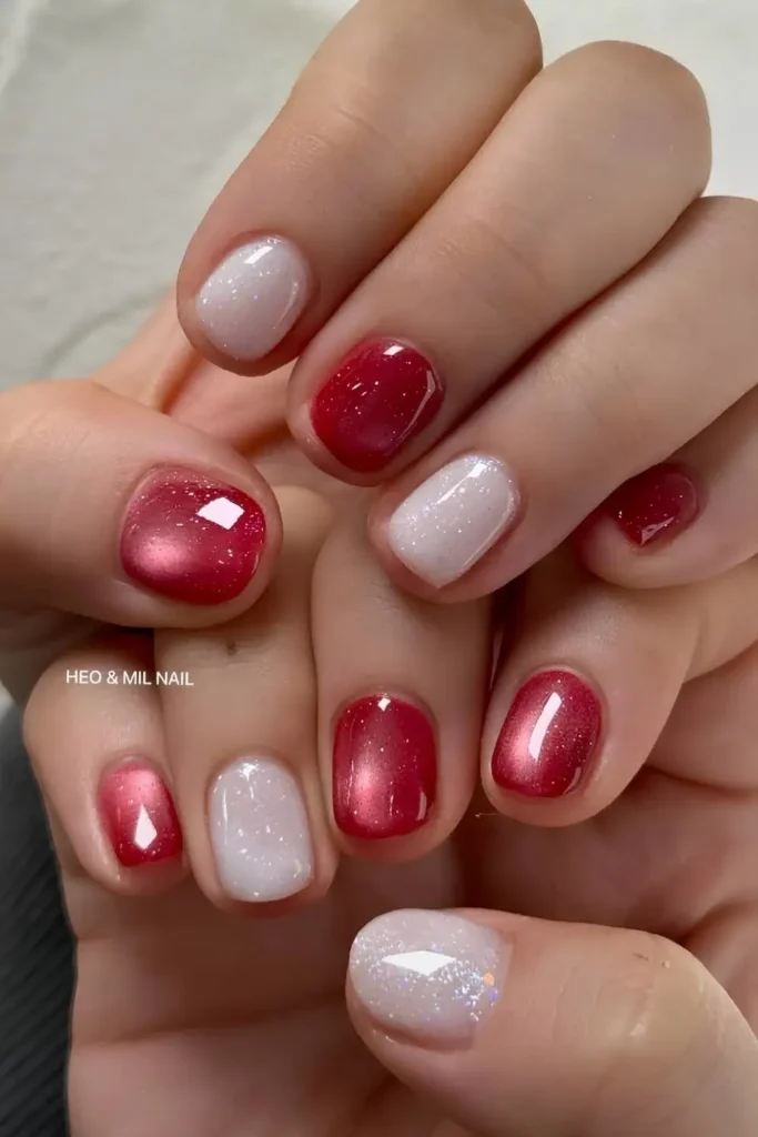 Red cat eye nails with shimmery white accents. by heojinhee_nail
