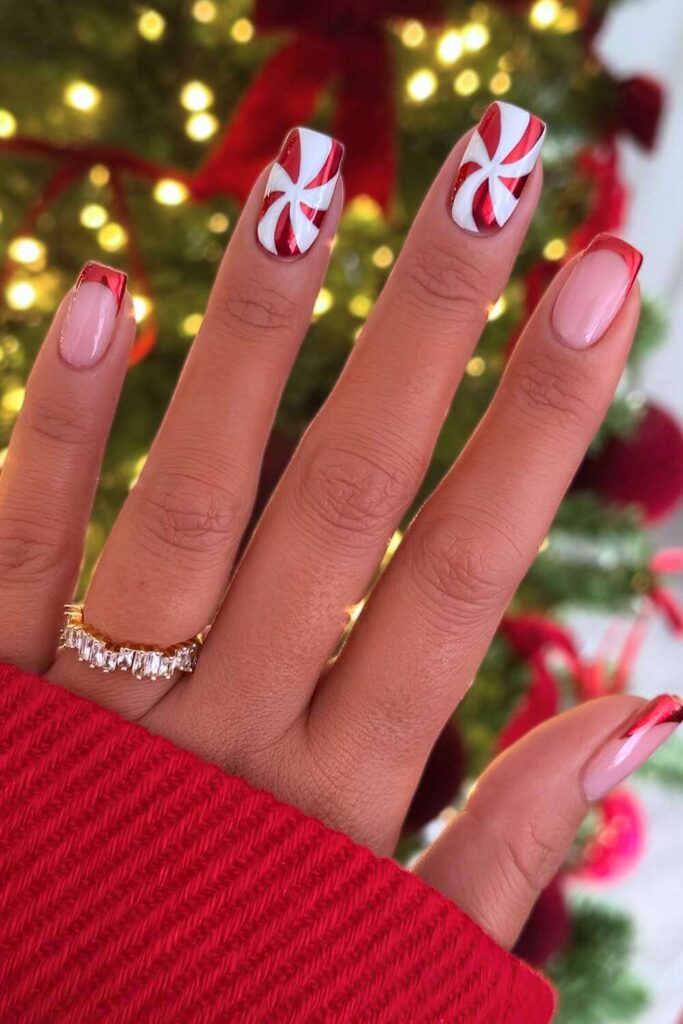 Red chrome nails with peppermint swirls. by beautyspace_charlotte