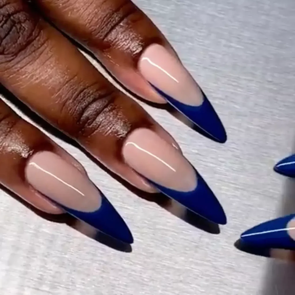 Rich blue tips on a neutral base. by disseynails