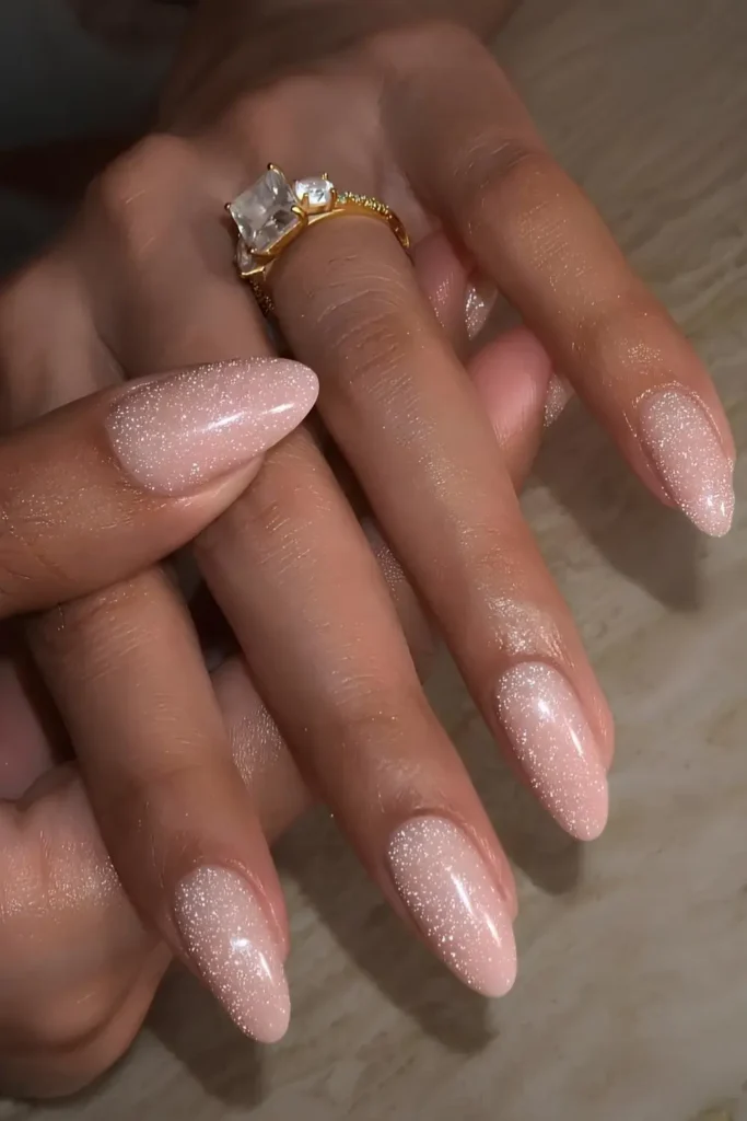 Shimmery neutral almond nails. by byalyshaelise
