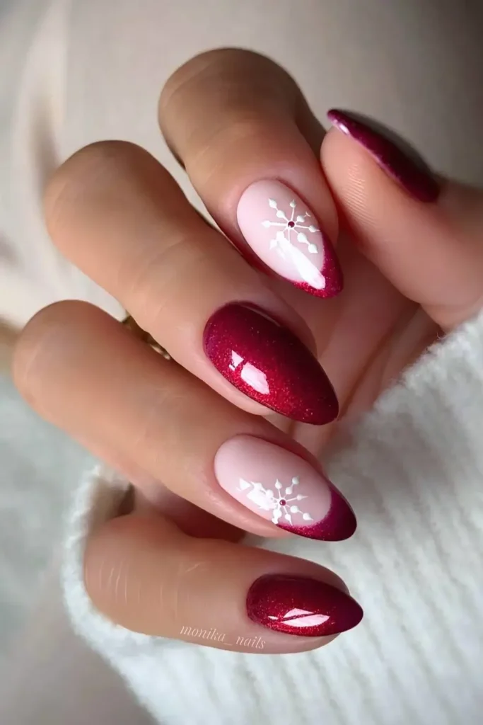 Shimmery red holiday nails with snowflakes. by monika__nails