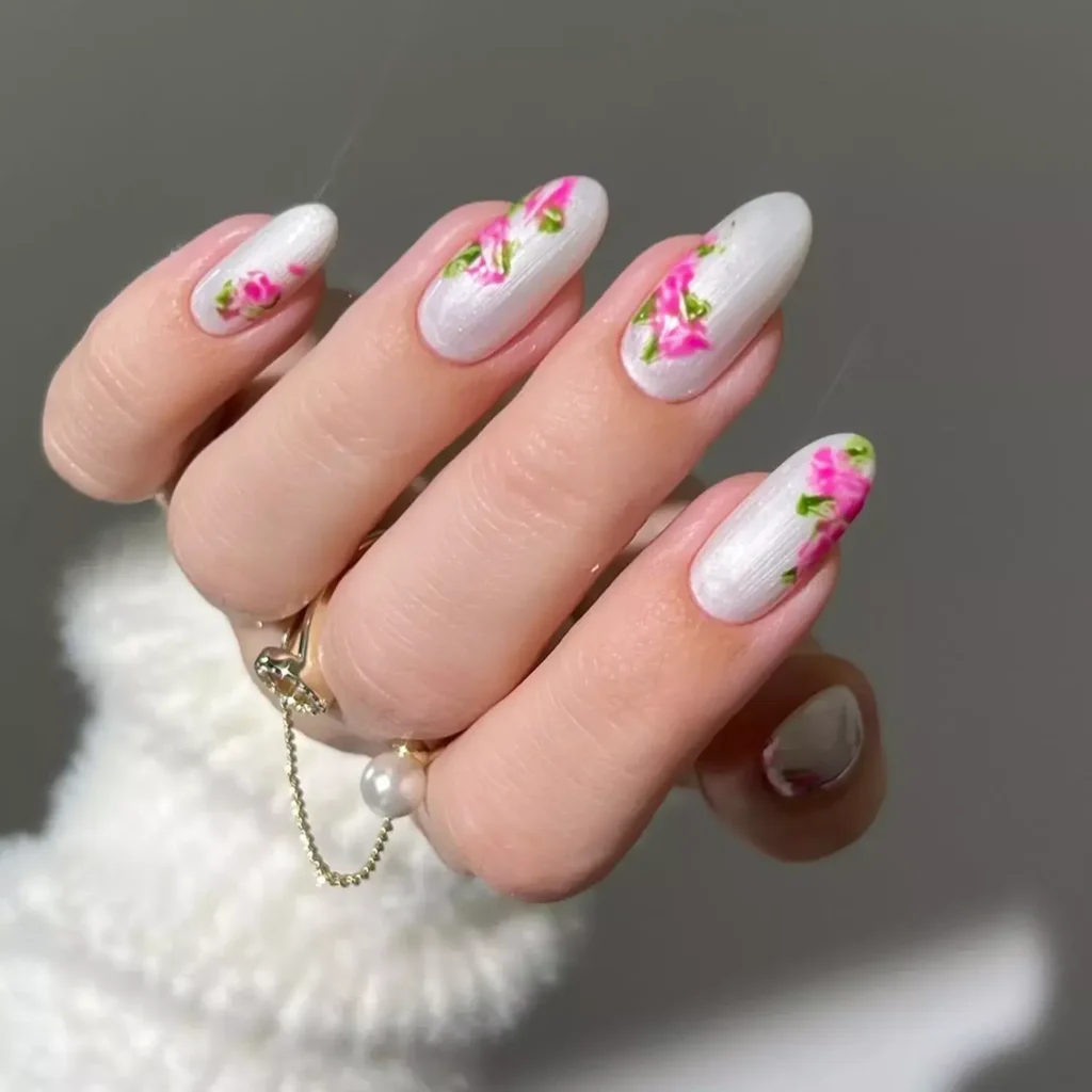 White base with soft pink peony floral details. by heygreatnails