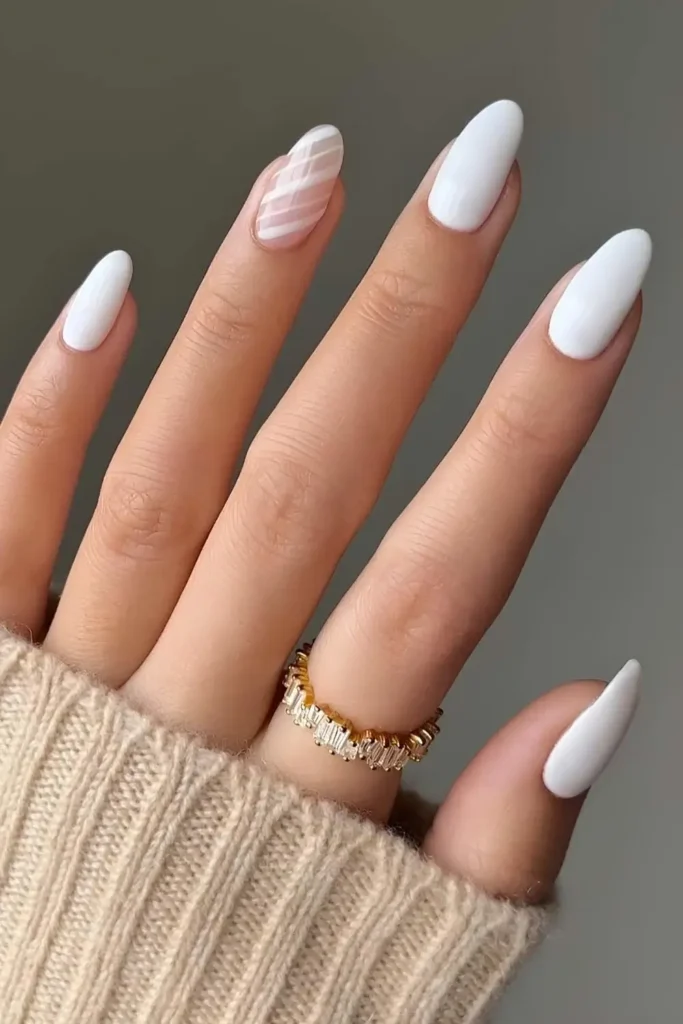 White nails with candy cane inspired stripes. by nailsbyalsn